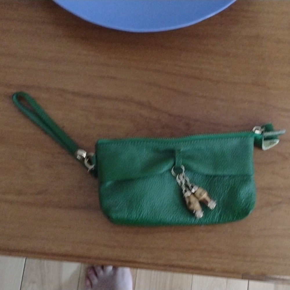 Kelly green leather wristlet.